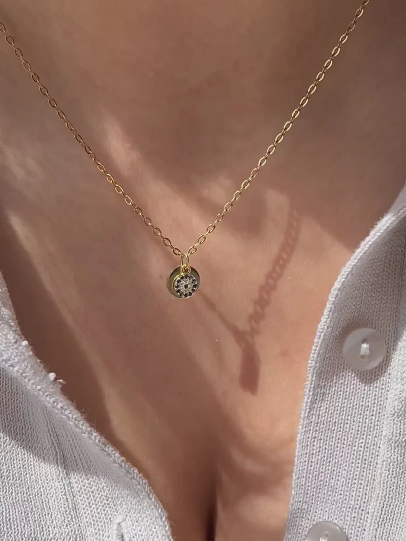 Secret initial pendant with evil eye