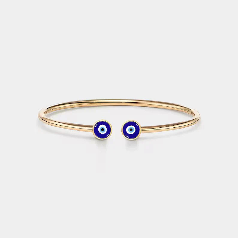Close-up of the Eraya Jewel Evil Eye Nazar Bracelet in gold plated finish, showcasing the vibrant blue evil eye charm