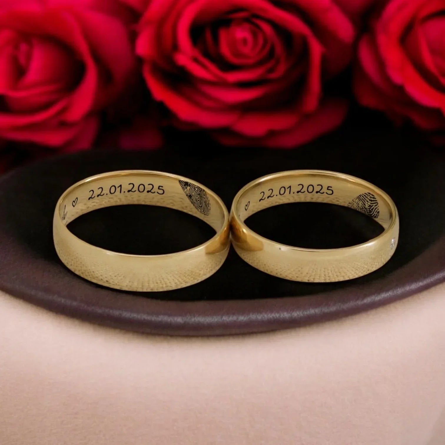 A gold ring from Eraya Jewel with the name "Theodore" engraved on the outside.