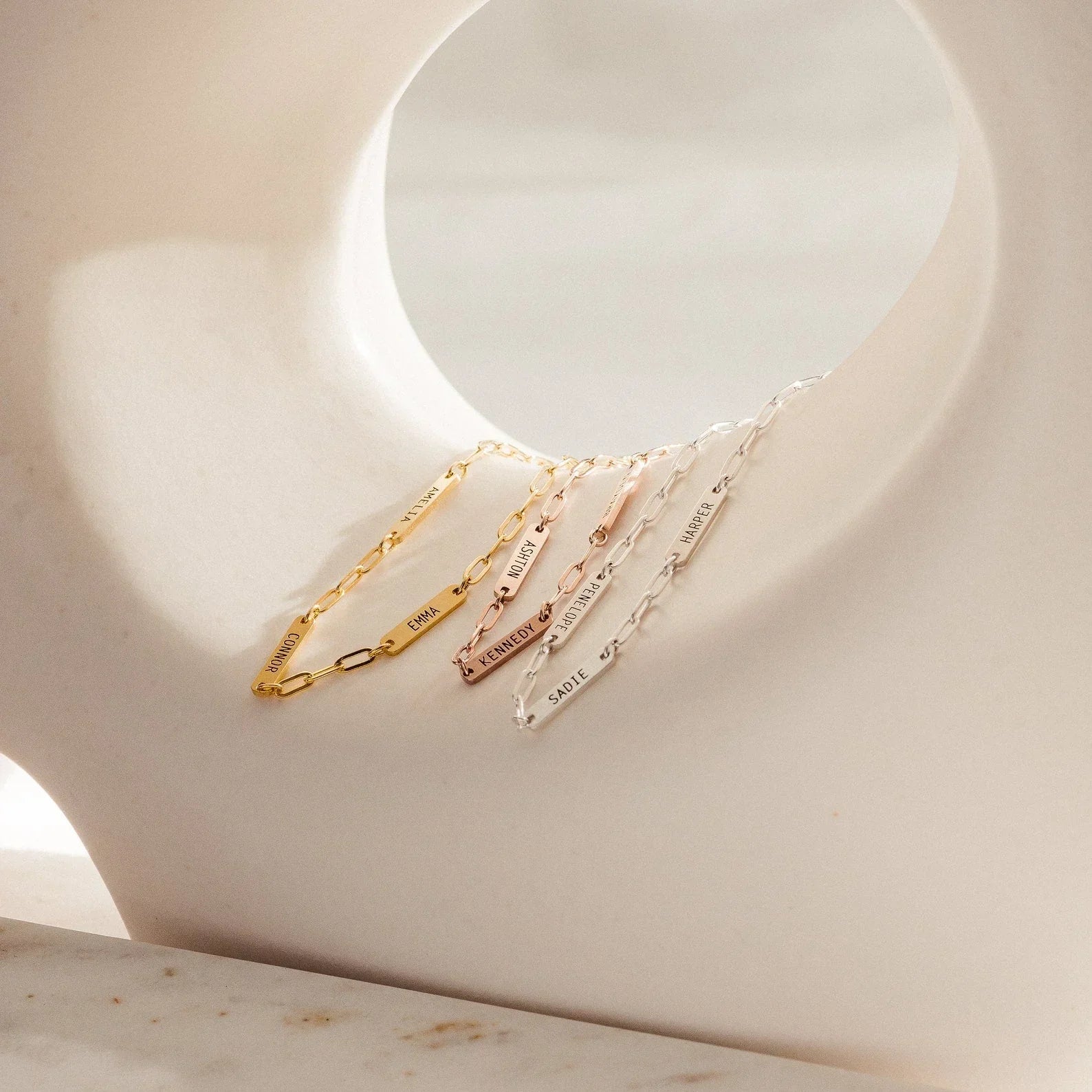 Eraya Jewel Engraved Mini Name Bar Bracelets available in Gold, Silver, and Rose Gold finishes – Product image showing personalized options