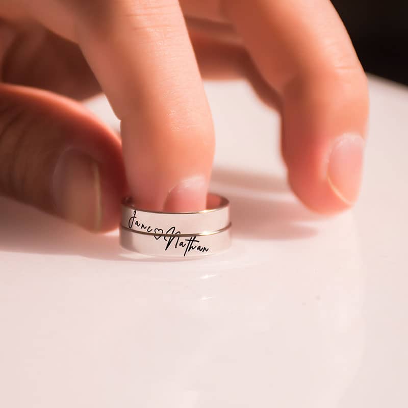Custom Handwriting Cross Couple Ring Set showcasing matching engraved bands.