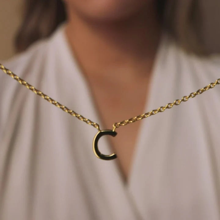 Minimal initial necklace