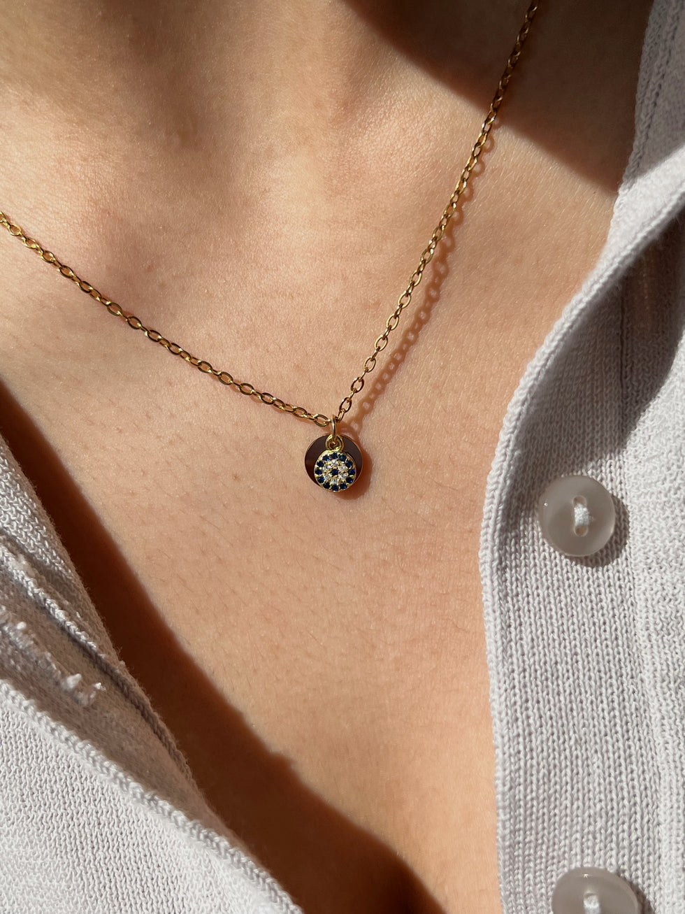 Secret initial pendant with evil eye